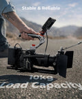 Person holding Dual Mount Camera Top Handle With NATO Clamp And ARRI Locating Pins, Replaceable Silicone Pad on camera rig outdoors