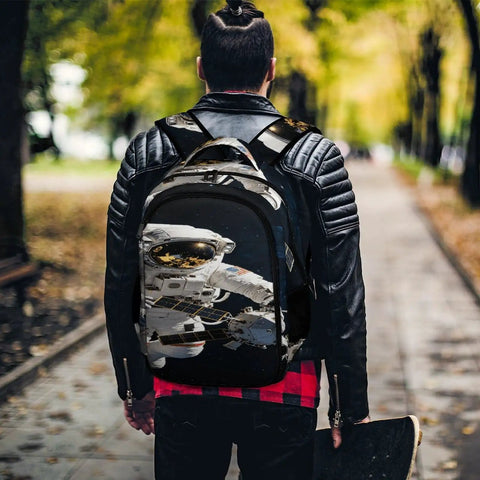 Person wearing Space Satellite Print Unisex Backpack With Large Capacity Durable Polyester Build Breathable Easy To Clean Smooth Zipper Dope Style And Lightweight Everyday Carry For School Or Travel