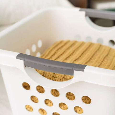 Close-up of 30L Plastic Laundry Hamper With Built In Comfort Carry Handles 2 Pack Nestable Ventilated Clothes Basket with knitted blanket