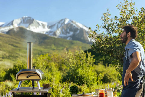 Karu 12 Multi Fuel Outdoor Portable Pizza Oven Delivers 950 F Heat For Wood Or Propane Cooks 12 Inch Pizzas In 60 Seconds
