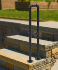 Rock Solid U Shape Stair Handrail Beefy Galvanized Steel Floor Standing Support Railing with weather resistant black coating on steps.