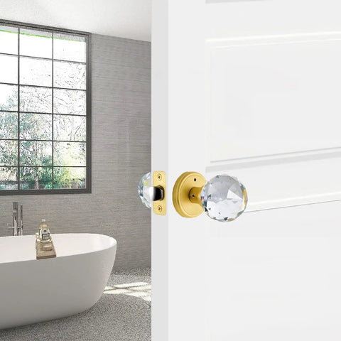 Crystal Glass Door Knobs With Privacy Lock For Bedroom And Bathroom, Gold Satin Brass Finish, shown on a white interior door