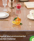 Clear Table Protector Mat 14 By 24 Inches, 1.5mm Thick Heavy Duty Desk Cover on a wooden dining table with dishes and decor.