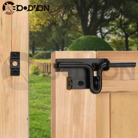 Beast Mode Heavy Duty Slide Bolt Gate Latch Black Powder Coated Steel Barn Door Hardware with padlock hole on wooden gate.