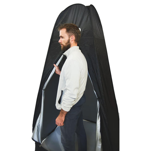 Man standing in Instant Pop Up Privacy Shelter Tent With Portable Toilet And Outdoor Shower Easy Camping Changing Room