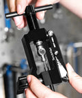 Hydraulic Brake Hose Fitting Kit With Insert Needle Driver Olive And Banjo Head Press Tool For Clean Cuts Pro Grade DIY Ready Mineral Brake Line Cutter All In One Repair Set Black in use, close-up view, showing cutting action.