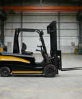 Smooth Operator Portable Mini Electric Forklift 4 Way Counterbalance Lift Truck With Adjustable Forks And Tough Solid Tires side view in warehouse.