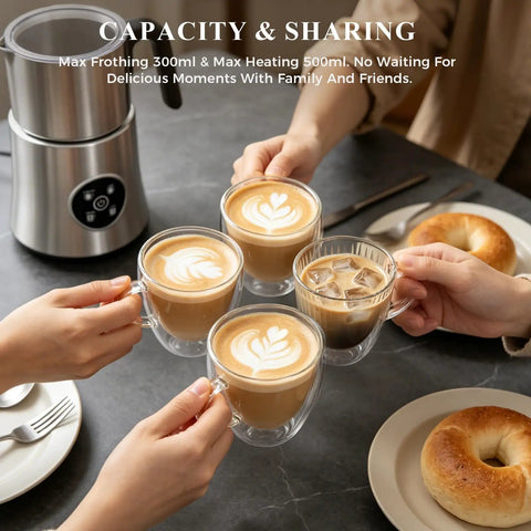 People toasting with lattes next to Electric Milk Frother And Steamer With Detachable Stainless Steel Jug For Hot And Cold Foam