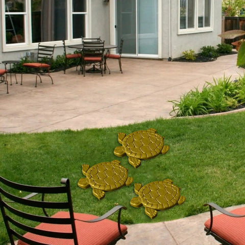 Turtle Shape Concrete Stepping Stone Molds For DIY Garden Paths And Patios Reusable Cement Molds placed on lawn near patio.