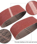 Close-up of 3x18 inch sanding belts with aluminum oxide paper, showing grit and interface detail, suitable for woodworking and DIY projects.