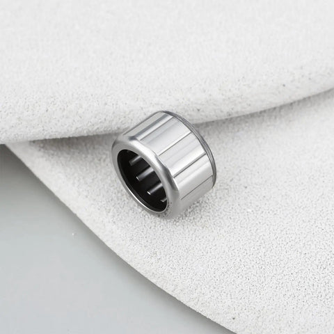 Drop In One Way Roller Clutch Bearing Replacement 6J540401 J54 0401 for Daiwa fishing reels on white textured surface