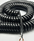Close-up of Heavy Duty Two Core Coiled Extension Cord With Smooth Retractable Stretch Design for easy indoor and outdoor use.