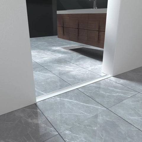 78 Inch Collapsible Shower Threshold Water Dam Barrier With Self Adhesive Silicone Splash Guard installed on bathroom floor
