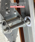 Installed 2 Inch Nylon Garage Door Roller With 6200Z Bearing And 4 Inch Stem, showing quiet operation on track
