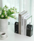 Sturdy Marble Book Ends Set Weighing 7lbs With Non Slip Pads For Stable Shelf Display shown with books on a white table