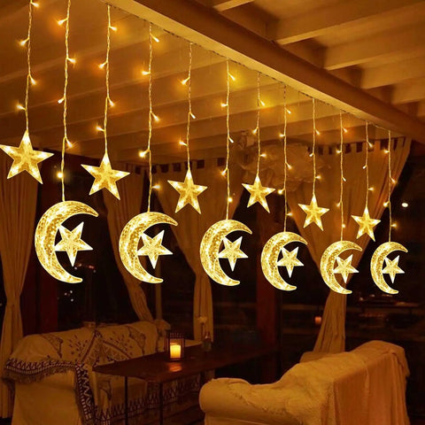 Solar String Lights Outdoor for Ramadan Eid Decor, 138 LED Star Moon Curtain Lights on a patio with warm glow