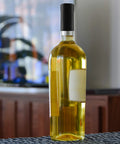 Wine bottle with black Shrink Bands 50x60mm Black Pack Of 200 Tamper Evident Seal For Hot Sauce And Other Liquids Fits Three Quarters To One Inch Diameter Durable Heat Shrink Wrap For A Clean Professional Packaging Look.