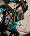 Person fixing bike with 96 Pcs Bike Tire Patches Not Self Adhesive Rubber Patch For All Inner Tubes Outdoor Cycling Road Emergency Repair Kit