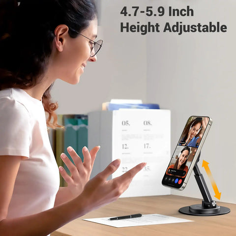 Magnetic MagSafe Phone Stand For Desk, black, holding iPhone in a video call, height adjustable 4.7–5.9 in, 360 degree rotation.