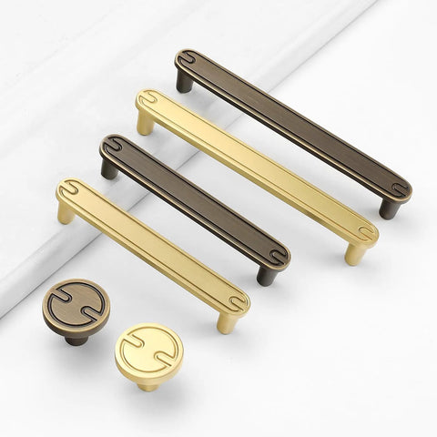 Four Pack Three Point Eight Inch Coffee Antique Brass Cabinet Pulls Handles, shown in antique and polished finishes, top view.