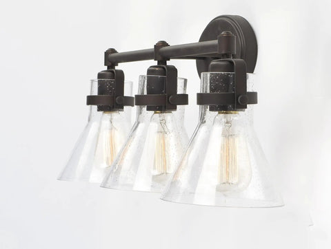 Seafarer 3 Light Bath Vanity Light In Oil Rubbed Bronze Steel Finish With Seeded Glass Shades Industrial Indoor Fixture