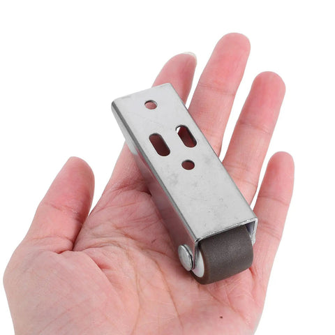 Heavy Duty Sliding Door Bottom Roller Wheels With Thick TPE Rubber Casters For Ultra Smooth And Dead Silent Glide On Wood Barn Doors Cabinet Slides, shown in hand.