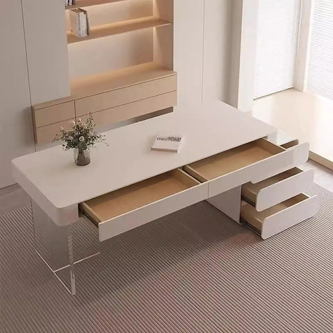 Cream L Shaped Desk With Plenty Of Storage Drawers And Smooth Rolling Wheels Floating Clear Acrylic Legs Office Salon Workspace Game Changer Boss Setup Straight Up Heavy Duty with open drawers and floral decor.
