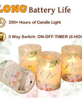 Flameless Real Wax Floral LED Candles With Remote And Timer 4 Pack For Home Decor Parties And Holiday Tables Glass Covered Flickering Candles Create Cozy Ambience Without Mess, showing battery compartment and floral candle design emphasizing long battery life with timer option.