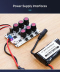 Power supply interfaces of Six Channel Servo Tester And Motor Controller For RC Cars Planes And Robots with battery connected.