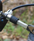 Flat End 1 Quarter Inch Hex To Square Socket 2 In 1 Extension Bit Driver attached to tool handle