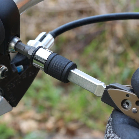 Flat End 1 Quarter Inch Hex To Square Socket 2 In 1 Extension Bit Driver attached to tool handle