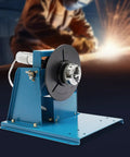 Heavy Duty Welding Positioner Turntable 22.05 Lbs 110V Portable Welder Positioner With Chuck And Foot Switch For Precise Clamping, Grinding, Cutting And Assembly Tasks In Any Shop. Blue metal welding turntable with chuck and base plate