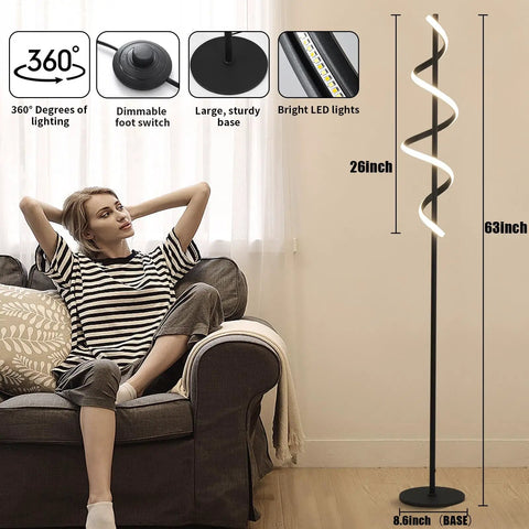 Tall Black Spiral Torchiere Floor Lamp With Remote Dimming And Color Changing LED, 63 Inch Tall beside a seated person