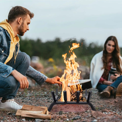 14 Inch Fireplace Log Grate With Ember Retainer Heavy Duty Steel Firewood Rack in use outdoors for camping, stable four leg support
