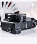 Canon EF To Micro Four Thirds Focal Reducer Booster Adapter 0.71x on Panasonic camera body, side view