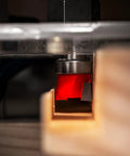 Three Quarter Inch Mortising Bit With One Half Inch Shank Pro Grade For Router And CNC Machines in action cutting wood.
