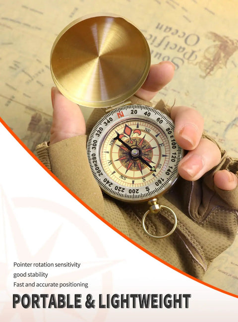 Hand holding a Waterproof Brass Compass For Hiking And Survival With Large Dial And Glow In The Dark Markings in map background