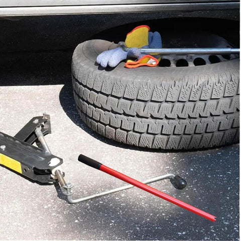 Rock Solid Vertical Hydraulic Bottleneck Jack For Cars 5 To 10 Ton Capacity Red Compact Portable Design With Tough Carbon Steel Handle next to a tire and gloves.