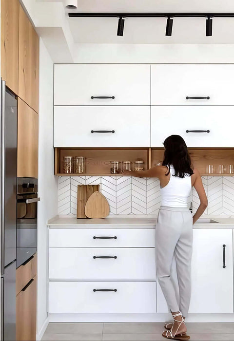 Sleek Matte Black Cabinet Pulls 10 Pack With 5 Inch Center To Center Spacing on modern kitchen cabinets with white finish.