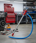 Beast Drill Powered Spiral Oil Transfer Pump With Reversible Bidirectional Action Liquid Extractor Auxiliary Handle Ideal For Workshop Automotive Service And Maintenance 1M Hose in garage