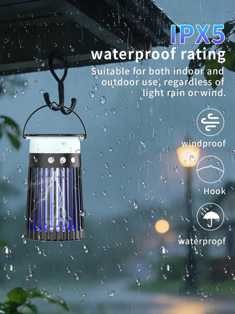 Solar Bug Zapper Portable Outdoor Waterproof Mosquito Killer Light hanging on hook in rainy outdoor setting