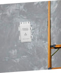 Heavy Duty White Waterproof Plastic Electrical Junction Box For Wiring Security Cameras And Electronic Components With UV Resistance For Outdoor Commercial Use mounted on a gray wall.