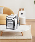 Heavy Duty Tool Backpack With Transparent Mesh Pockets For Tech Pros And Mechanics Durable Anti Static PVC Cleanroom Storage Organizer Built Tough Hella Spacious Black on a coffee table.