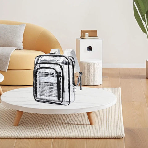 Heavy Duty Tool Backpack With Transparent Mesh Pockets For Tech Pros And Mechanics Durable Anti Static PVC Cleanroom Storage Organizer Built Tough Hella Spacious Black on a coffee table.