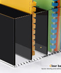 Close-up of clear acrylic desk organizer with 3 vertical compartments for files, magazines, and folders; black finish