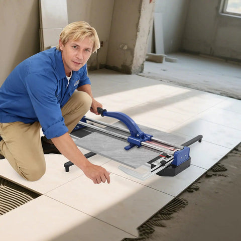 Man using 24 Inch Manual Tile Cutter With Tungsten Alloy Wheel And Guided Rail for precise ceramic cuts on the floor.