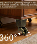 Four Pack Retro Bronze Square Base Caster Wheels With Heavy Duty Silent Ball Bearings And Ridiculously Smooth 360 Mobility So Your Furniture Rolls Like A Champ. Close-up of a bronze square caster wheel showing 360° rotation on wooden floor.