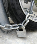 8mm Thick Hardened Steel Chain Lock With Beam Padlock 1.64 Feet Long securing a motorcycle wheel to a metal post.