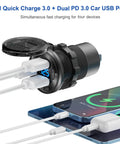 Heavy Duty Two In One Aluminum Panel With Four Usb Ports Paired With A Lighted 150 Watt Cig Socket And Built In Voltmeter Dual PD30 And Dual QC30 Fast Charge Board No Sweat Setup For Rv Boat, showcasing USB ports with device charging.