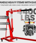 Rock Solid Folding Engine Crane 2 Ton 4400 Pound Capacity with adjustable boom and engine hoisted for easy repairs.